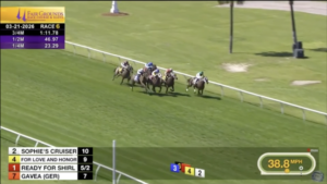 For Love and Honor shortens the distance to the front runner in the final stretch.